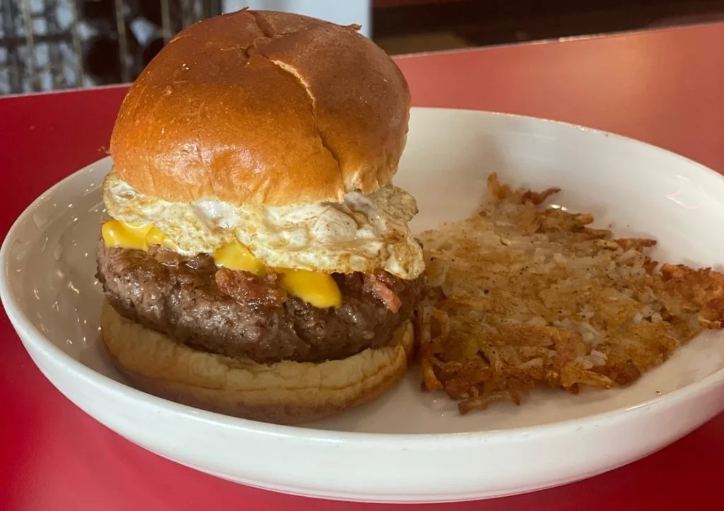 close-up of a breakfast sandwich at old school pizza and wings rocky river