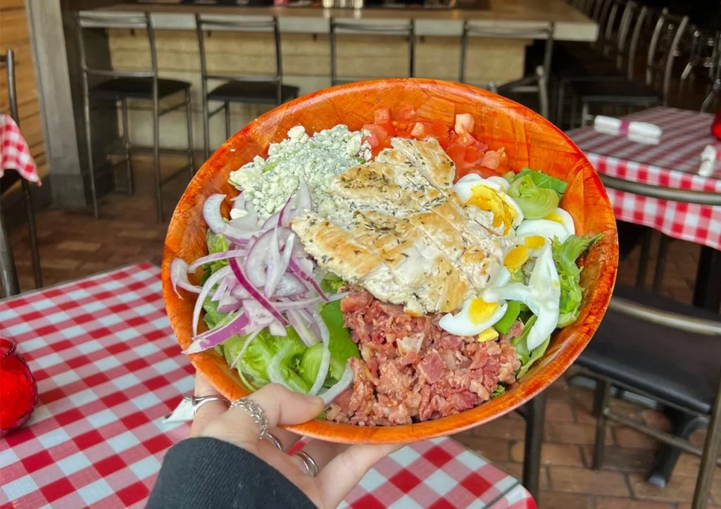 close-up of a salad at old school pizza and wings