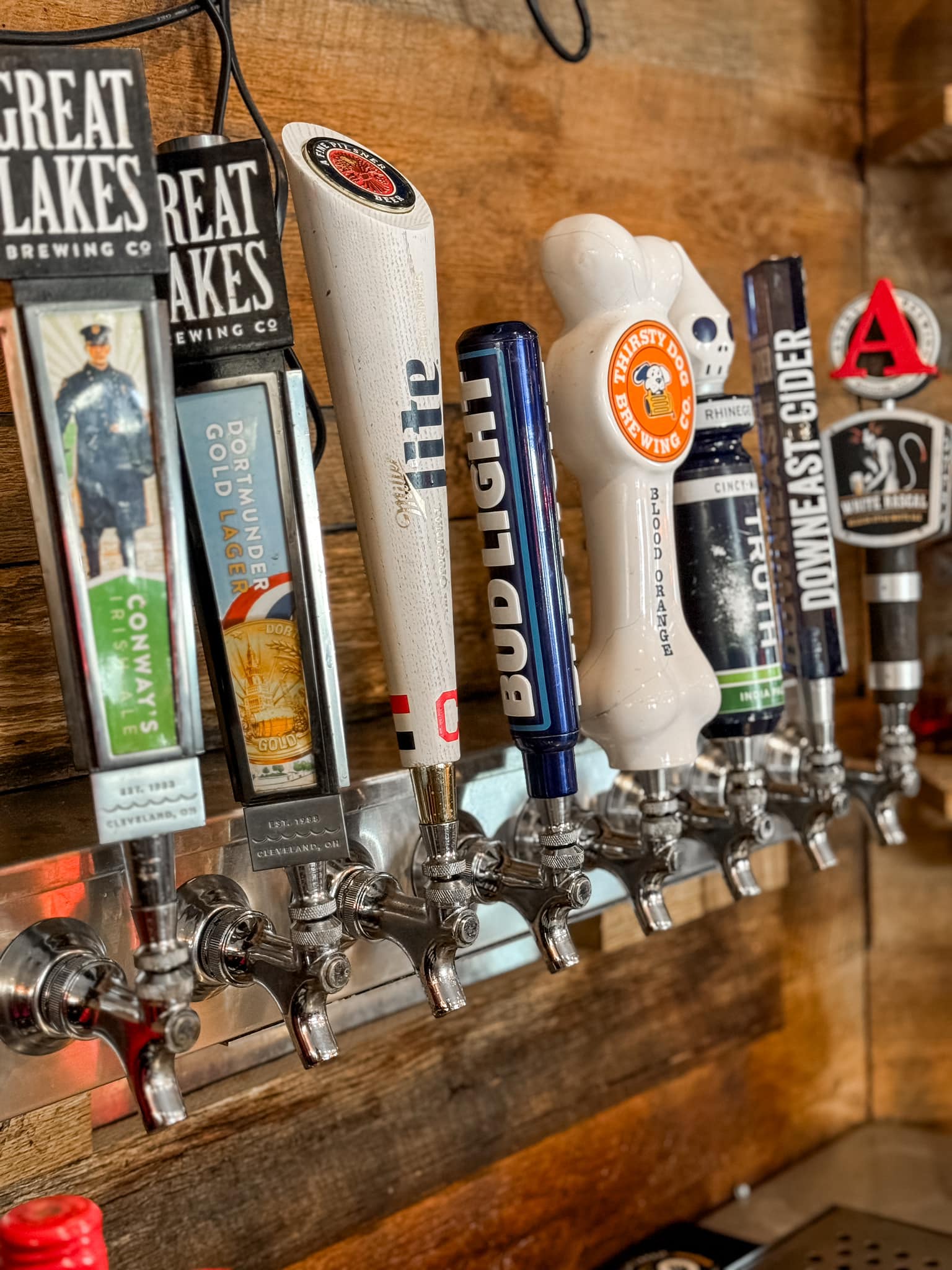 close-up of multiple different draft beers
