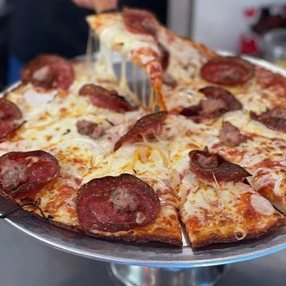 close-up of pizza freshly out of owen